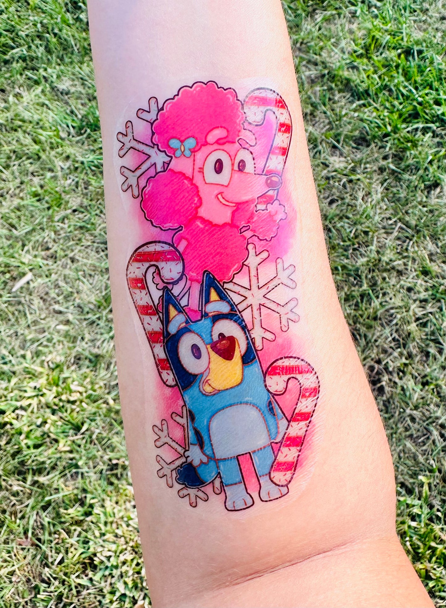 Pink Blue Pup Christmas Half Sleeve tattoo